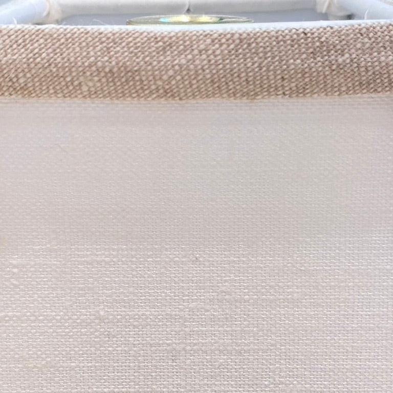 white linen lampshade with oatmeal tirm close up