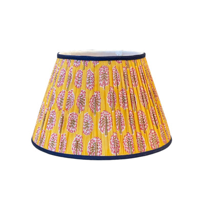 Yellow block print lampshade with blue trim