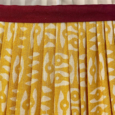 Penny Morrison yellow tribal lampshade with red trim close up