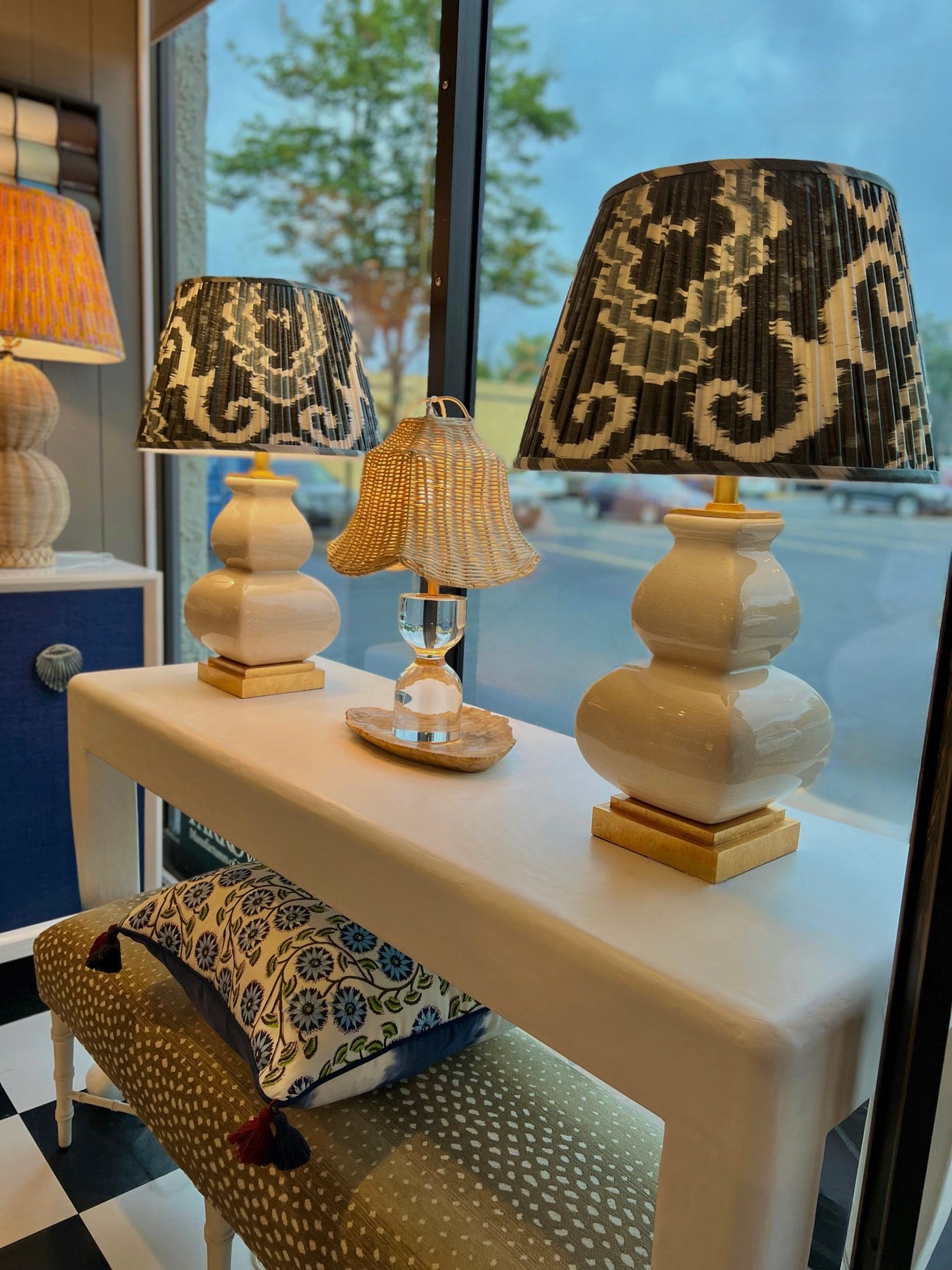 Grey and white ikat lampshades on ivory lamps
