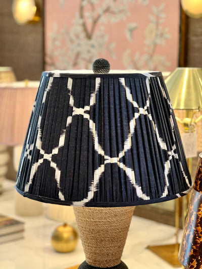 Black and white ikat lampshade on a nautical lamp