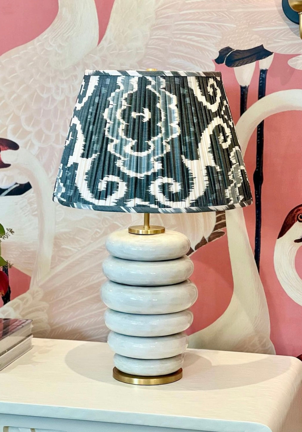 Grey and white ikat lampshade on a Phoebe lamp