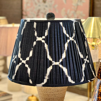 Black and white ikat lampshade on a nautical lamp